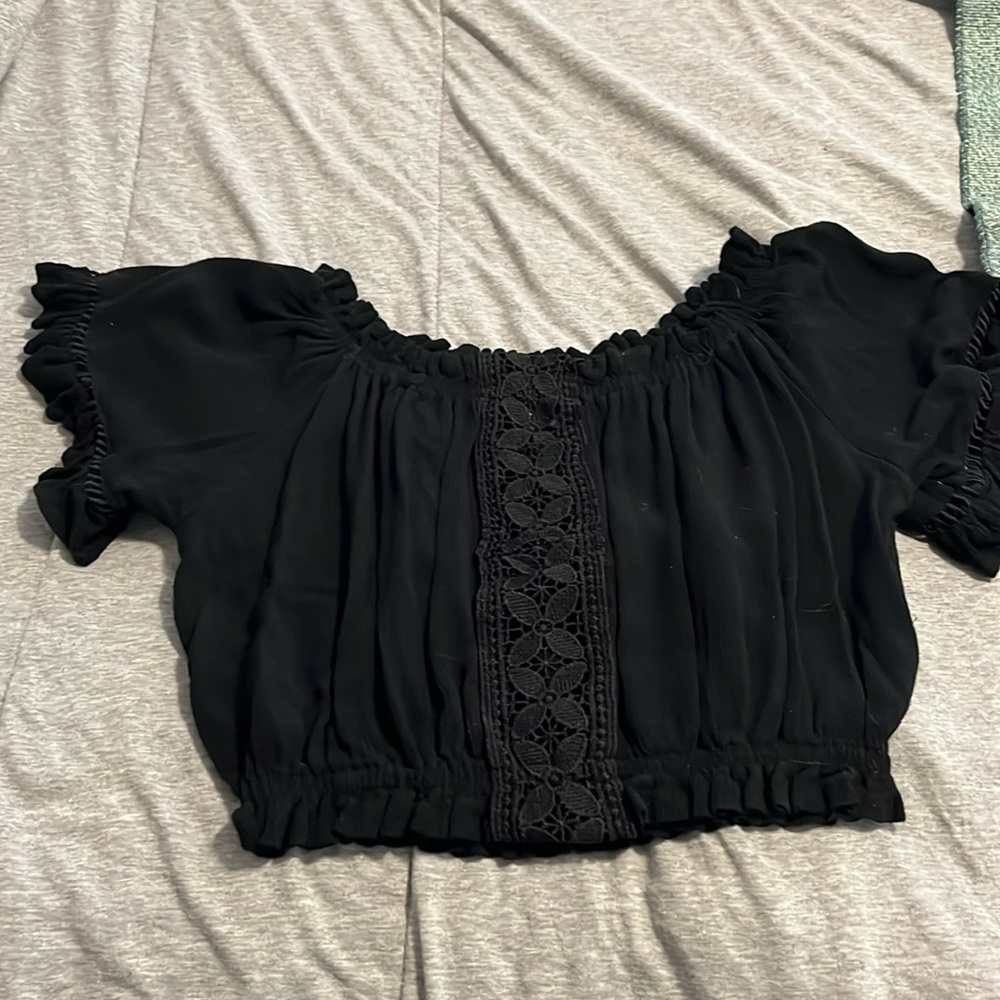 Black short sleeve or off the shoulder patterned top